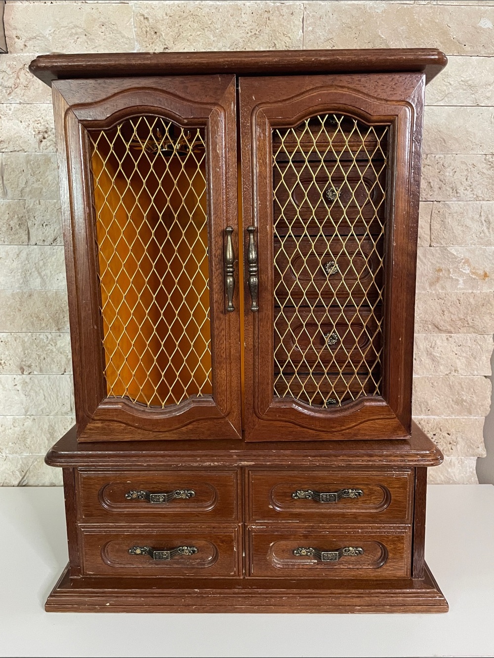 Vintage brown wooden jewelry box.